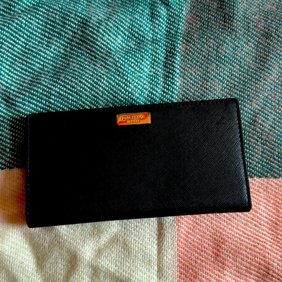 kate spade Handbags - Kate Spade slim black bifold wallet ✨ final reduction.